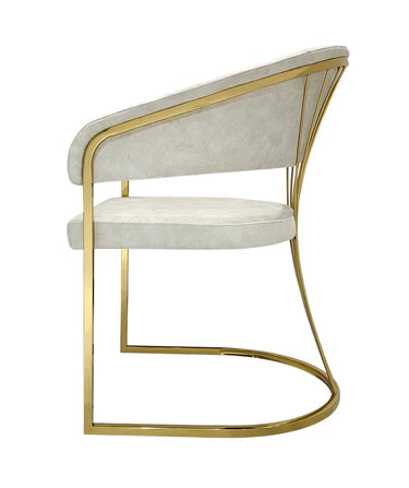 Side view of the Porado Cream and Gold dining chair featuring premium Leathaire upholstery, a gold stainless steel frame, and elegant contemporary styling for luxury dining spaces.