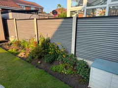 Premium grey oak composite fence panels completed installation by Solid Furniture UK