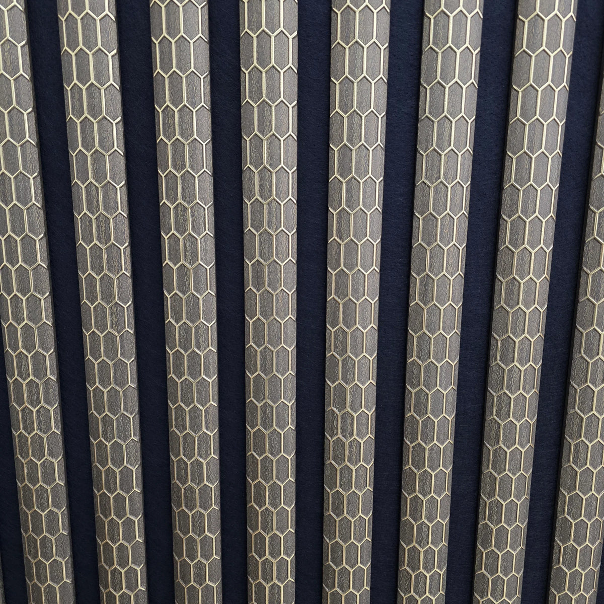 Premium quartz print brown acoustic wall panel 60x240cm with 3D gold line detail and slatted design main product view. solid furniture UK