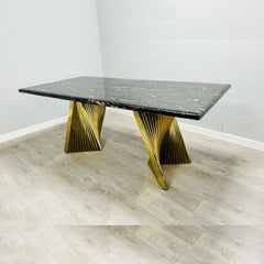 Ravello Black and Gold Marble Dining Table with luxury marble-effect tabletop and gold pedestal base, perfect for modern and contemporary dining rooms in the UK. solid furniture UK