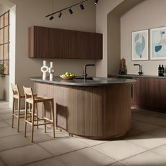 Modern interior featuring Reed flexible walnut wood veneer acoustic wall panels installed on wall with warm LED lighting creating a cozy and elegant atmosphere solid furniture UK