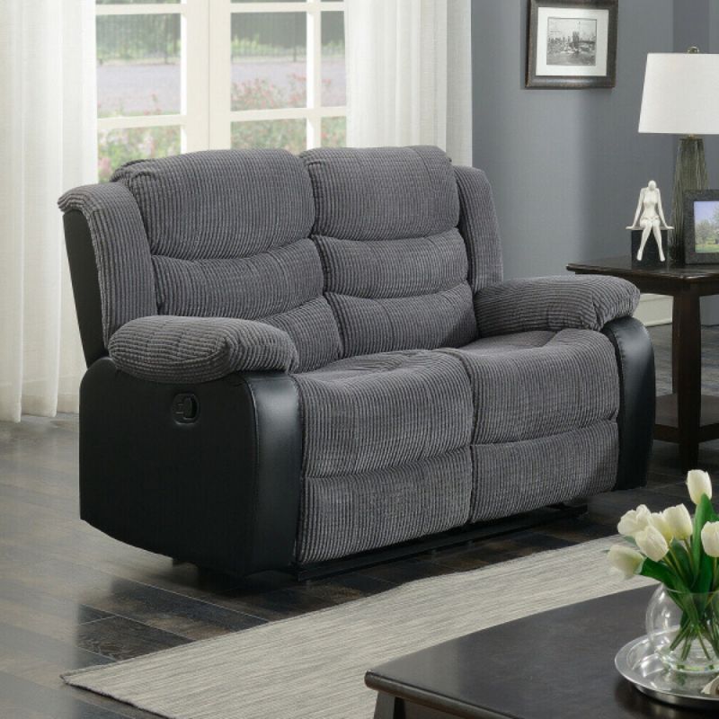 Angled view of Rio cord fabric 2 seater recliner sofa showing modern style and cushioning solid furniture UK
