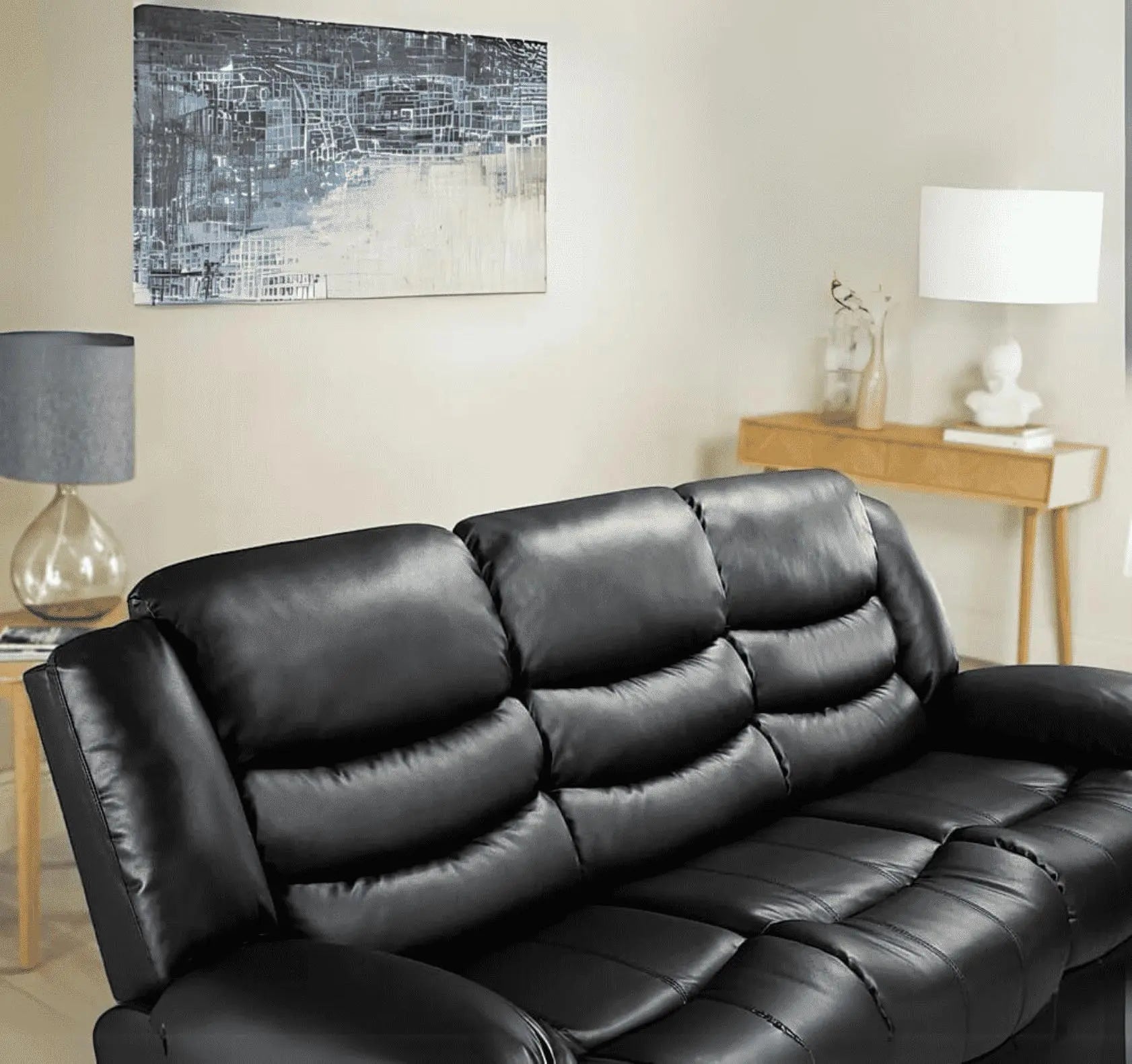 Close-up view of Roma 3 seater recliner sofa highlighting air leather texture and cushioned comfort solid furniture UK
