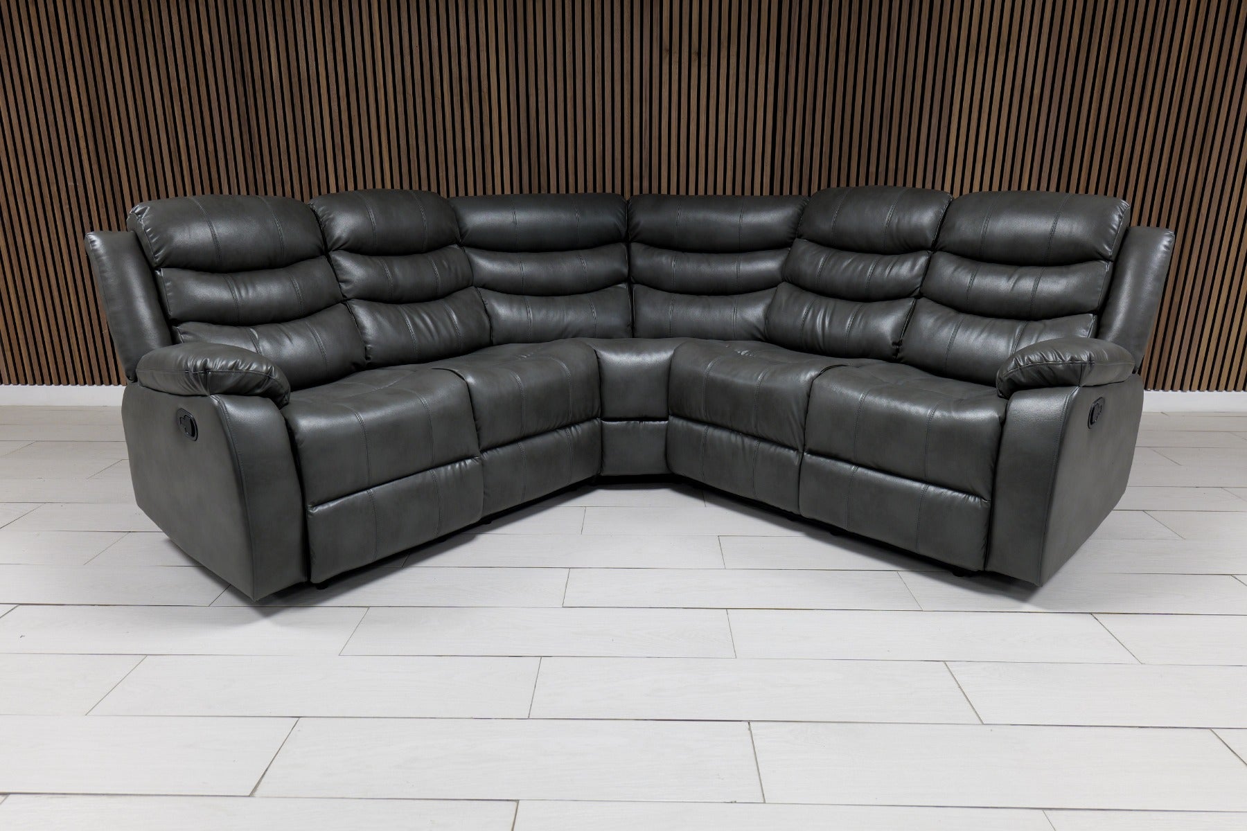 Roma grey leather recliner corner sofa in light and dark grey showing full oval shape and premium finish solid furniture UK