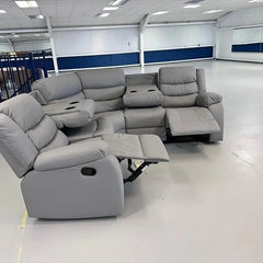 Angle view of Roma light grey leather recliner corner sofa highlighting its modern corner design Solid furniture UK