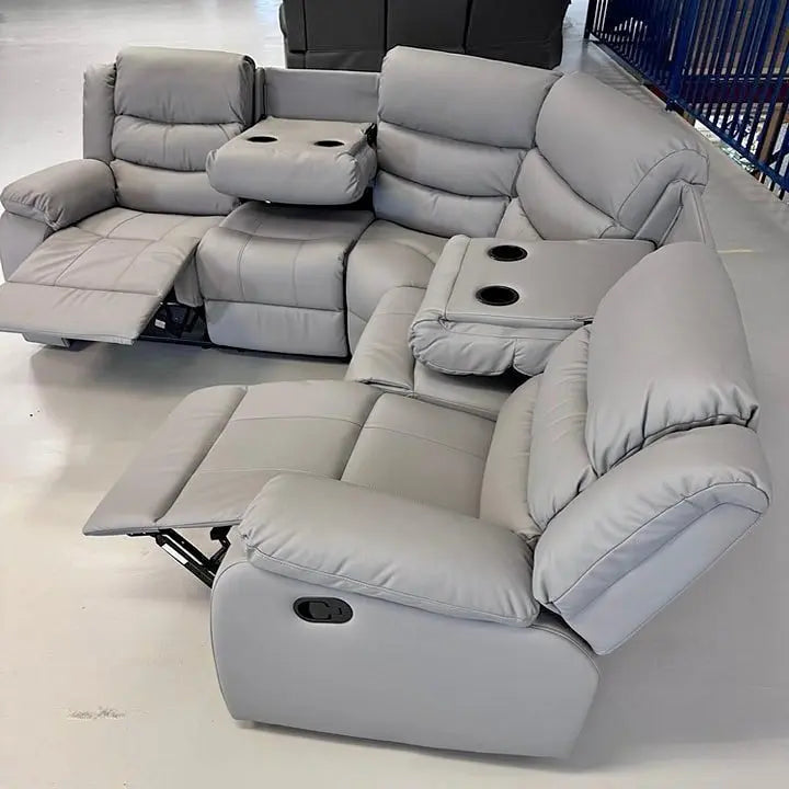 Side view of Roma light grey leather recliner corner sofa with reclining seats and cupholders solid furniture UK