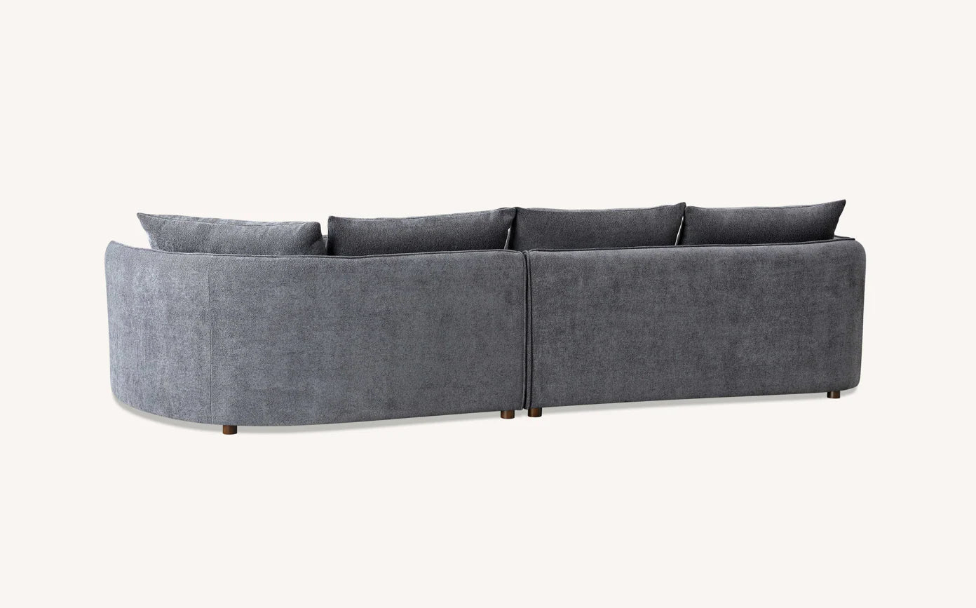 Back view of Rubin corner chaise sofa upholstered in charcoal bouclé fabric solid furniture UK