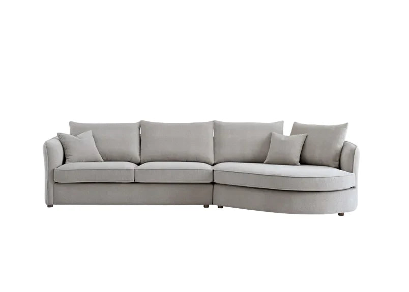 Front view of Rubin corner chaise sofa in pebble grey bouclé fabric with curved modern design
