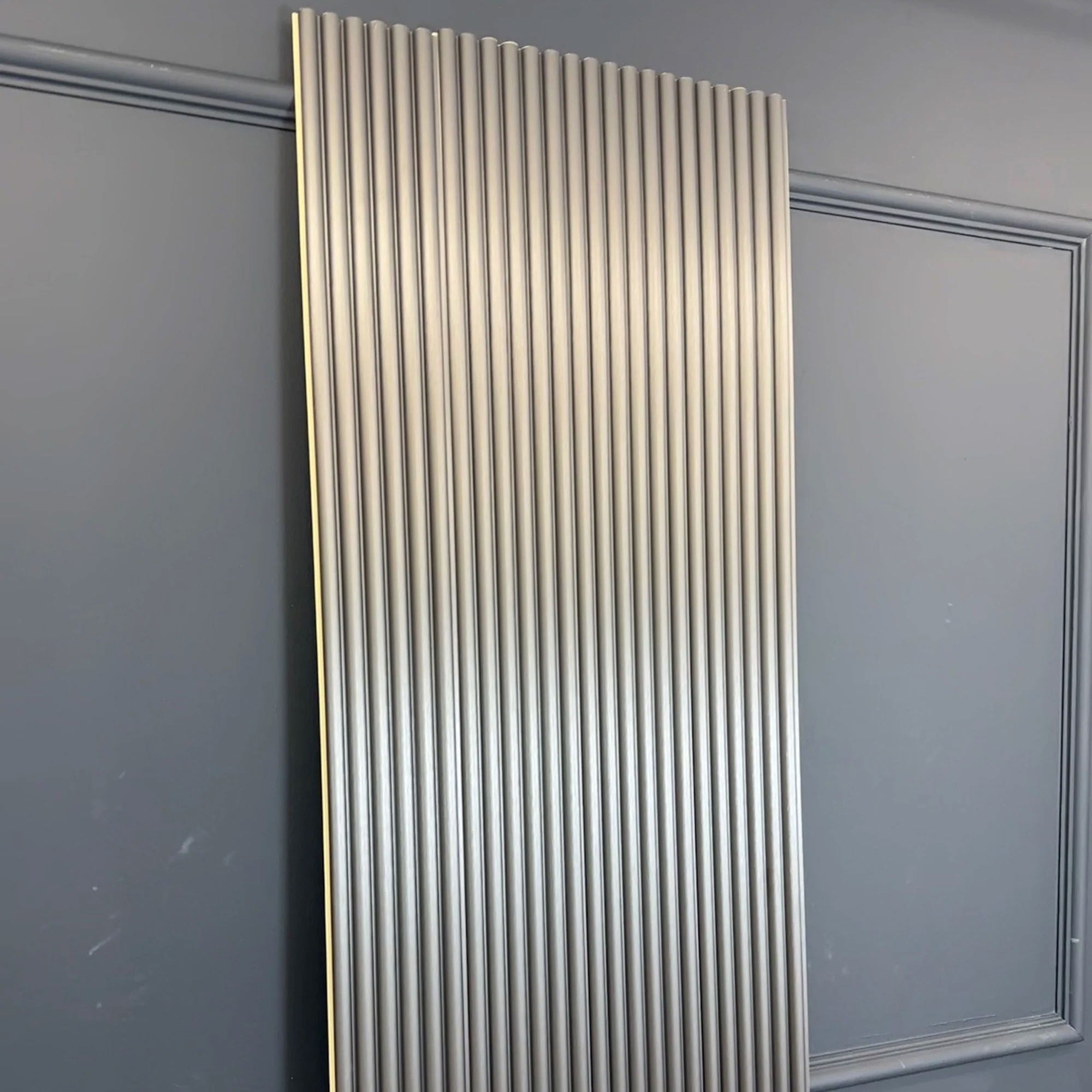 Metallic silver fluted wall panels by Solid Furniture UK in premium WPC