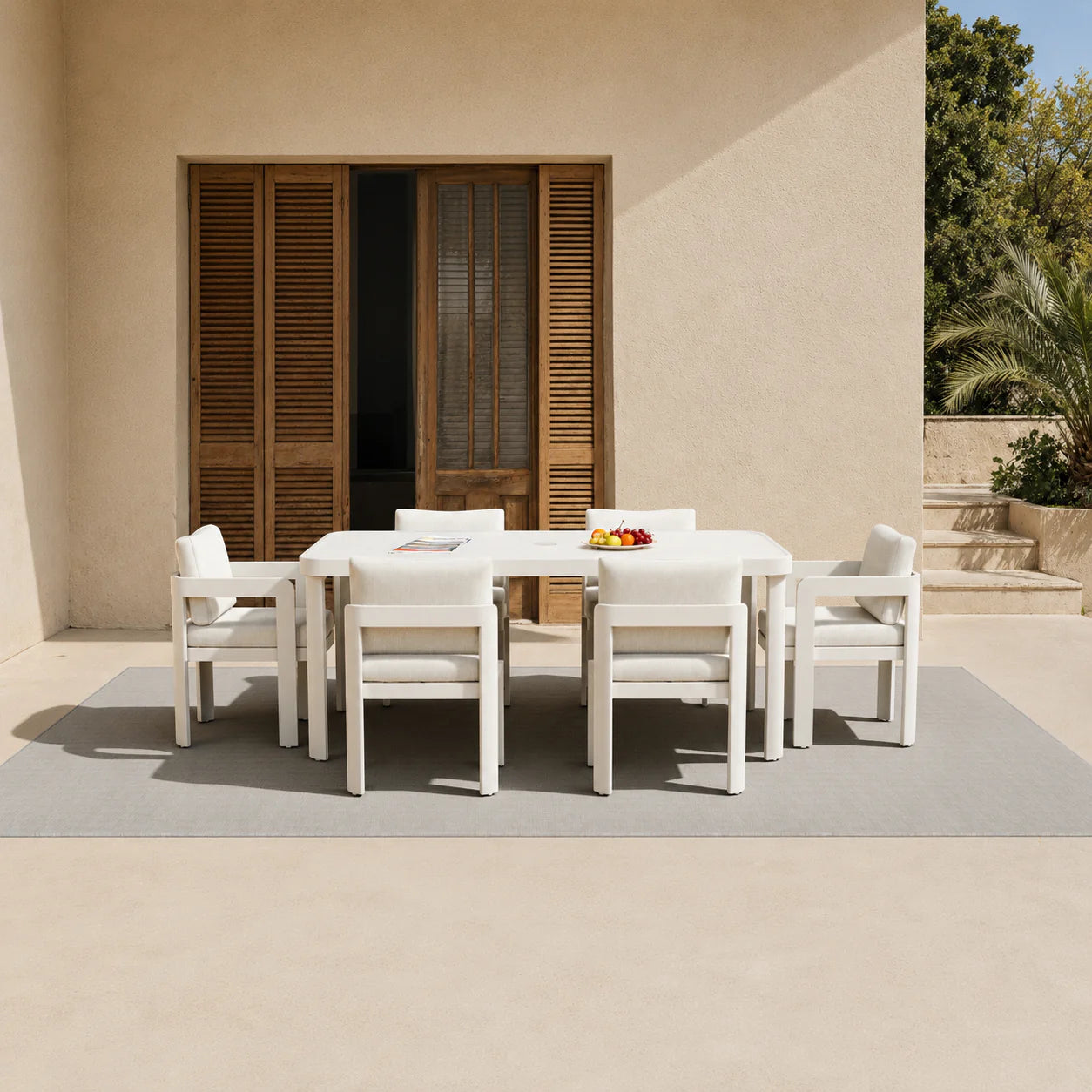 Sofia 6-seater dining table and chairs placed in a modern outdoor garden setting solid furniture uk