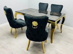 Black and gold Sofia Marble Dining Table with matching upholstered dining chairs in luxury dining space solid furniture UK