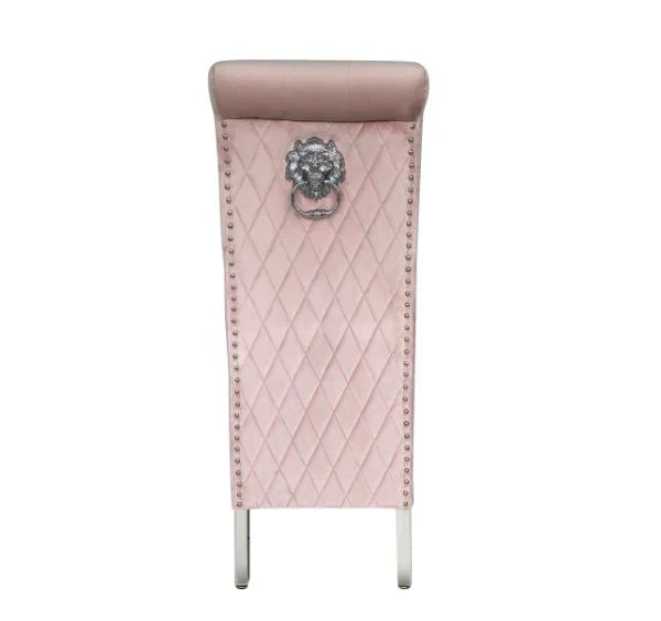 Side view of Sofia pink velvet dining chair with chrome legs and lion head knocker from Solid Furniture UK