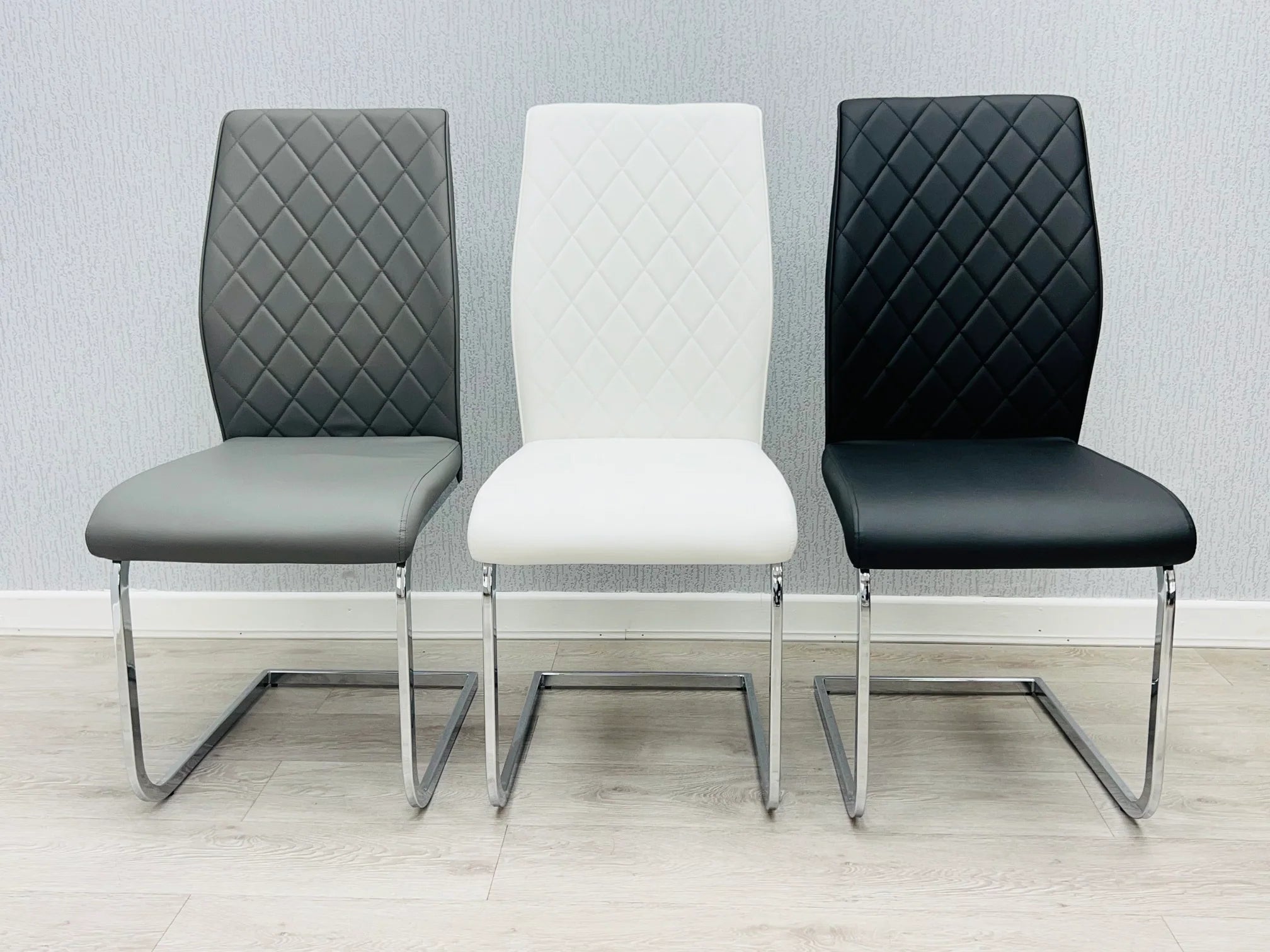 Atlantis Dining Chair available in black, white and grey PU faux leather dining chairs with chrome frame UK
