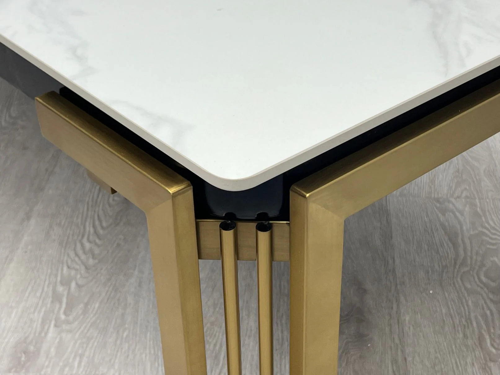 Sorrento rectangle ceramic dining table close up right side detail modern finish Solid Furniture UK