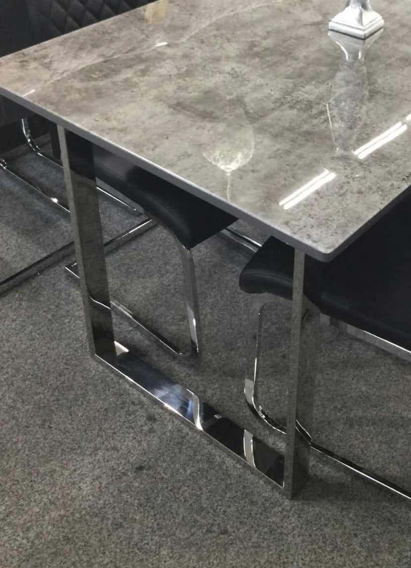 Close-up of Tokyo Dining Table grey stone-effect glass surface showing smooth finish and premium texture detail solid furniture UK