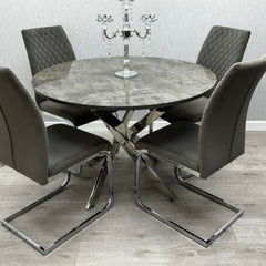 Tokyo round dining set featuring a grey stone effect glass table and four grey velvet chairs from Solid Furniture UK.