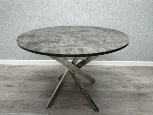 Tokyo round dining table with a grey stone effect glass top and contemporary design from Solid Furniture UK.