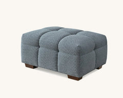 Matching footstool of the Tribeca Corner Group set in iron bouclé fabric, complementing the corner sofa and chaise solid furniture UK
