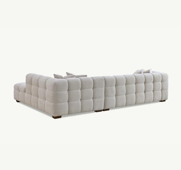 Back view of Tribeca RHF corner sofa in oatmeal bouclé showing clean finish and design - SOLID FURNITURE LTD
