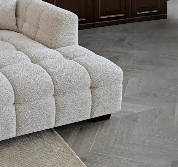 Angled corner view of Tribeca RHF corner sofa in oatmeal bouclé highlighting spacious seating - SOLID FURNITURE LTD