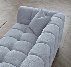 Angled view of Tribeca sofa range with pearl bouclé upholstery - SOLID FURNITURE LTD