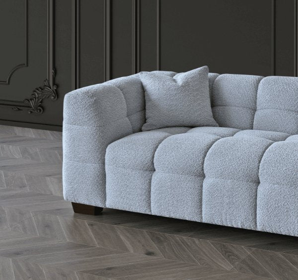Side corner view of Tribeca sofa in pearl bouclé fabric - SOLID FURNITURE LTD