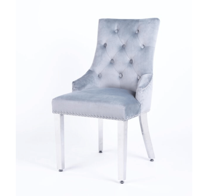 Front view of Valencia light grey PU leather dining chair with chrome legs and ring knocker detail UK modern dining chair from Solid Furniture UK