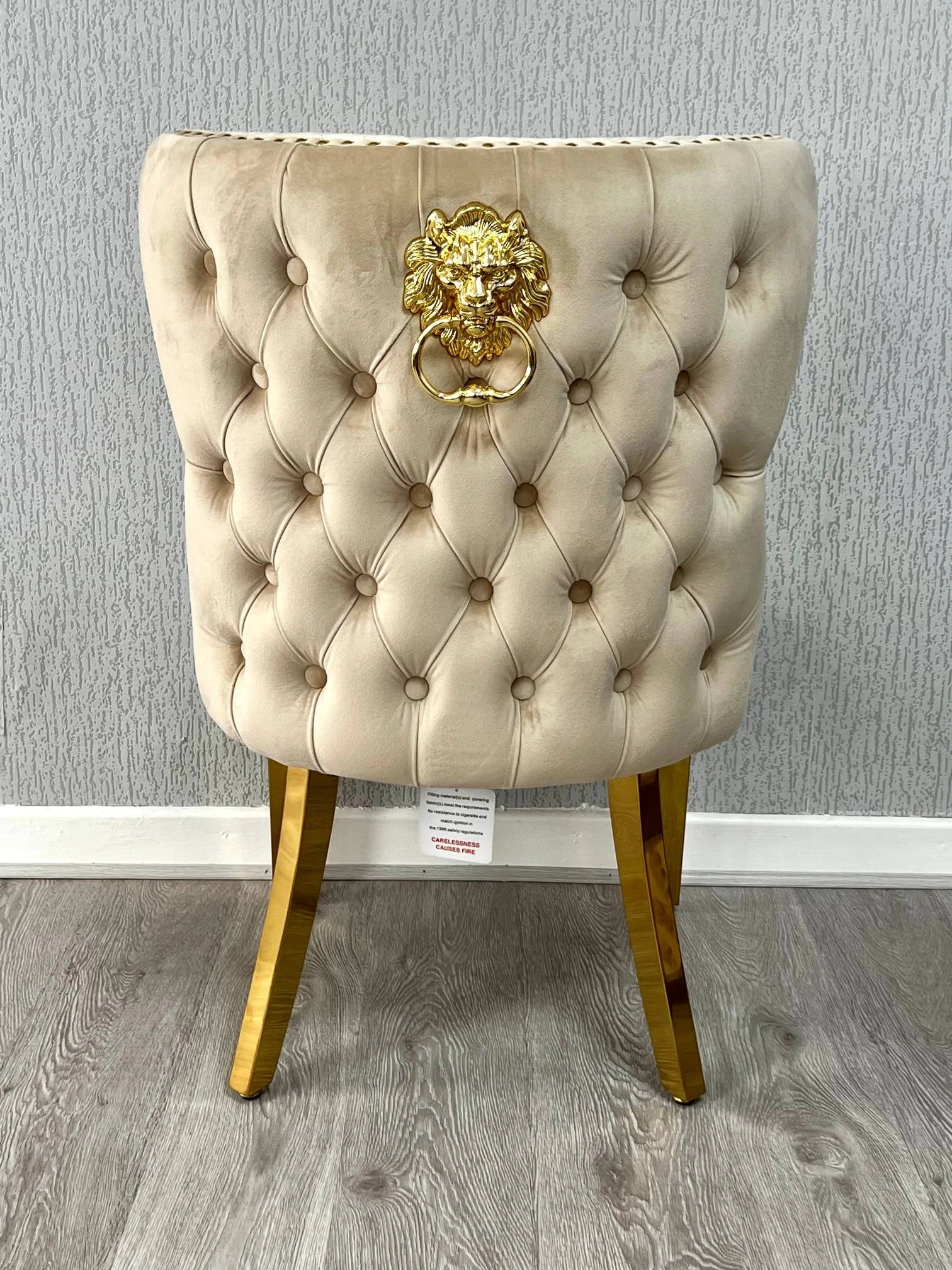 Back side view of Valentino mink velvet dining chair featuring lion head knocker detail, gold-finished legs and luxury upholstered design by solid furniture uk