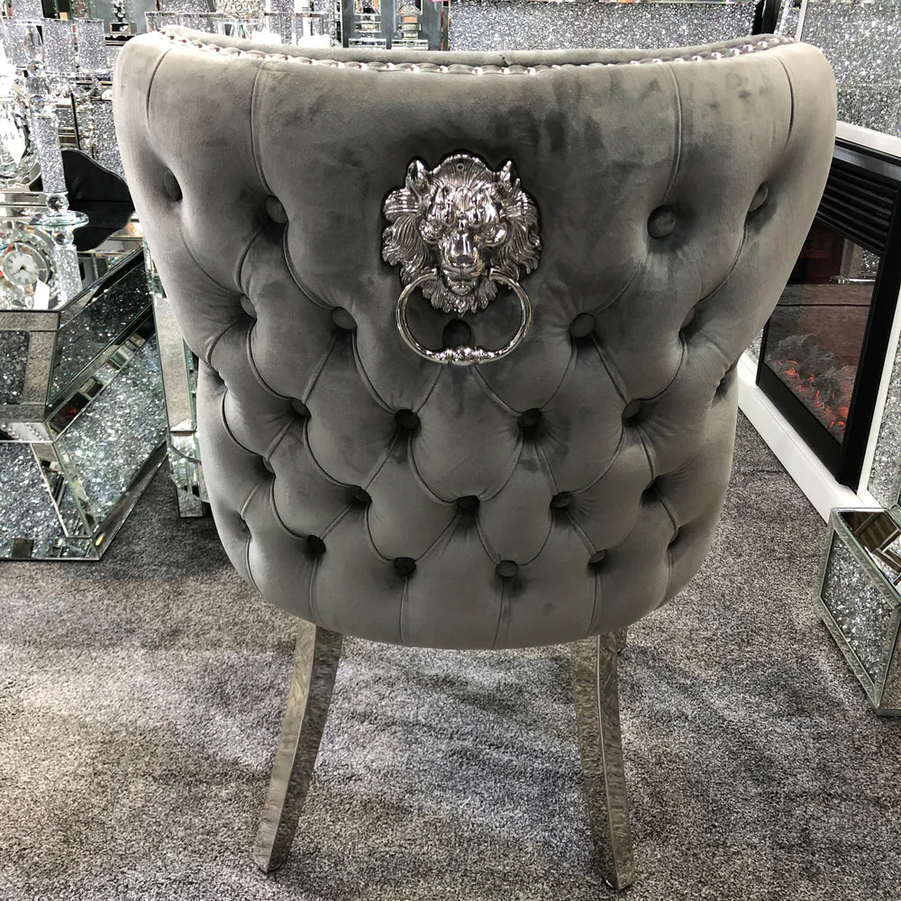 Solid Furniture UK back view of grey Valentino velvet dining chair with chrome legs and lion knocker