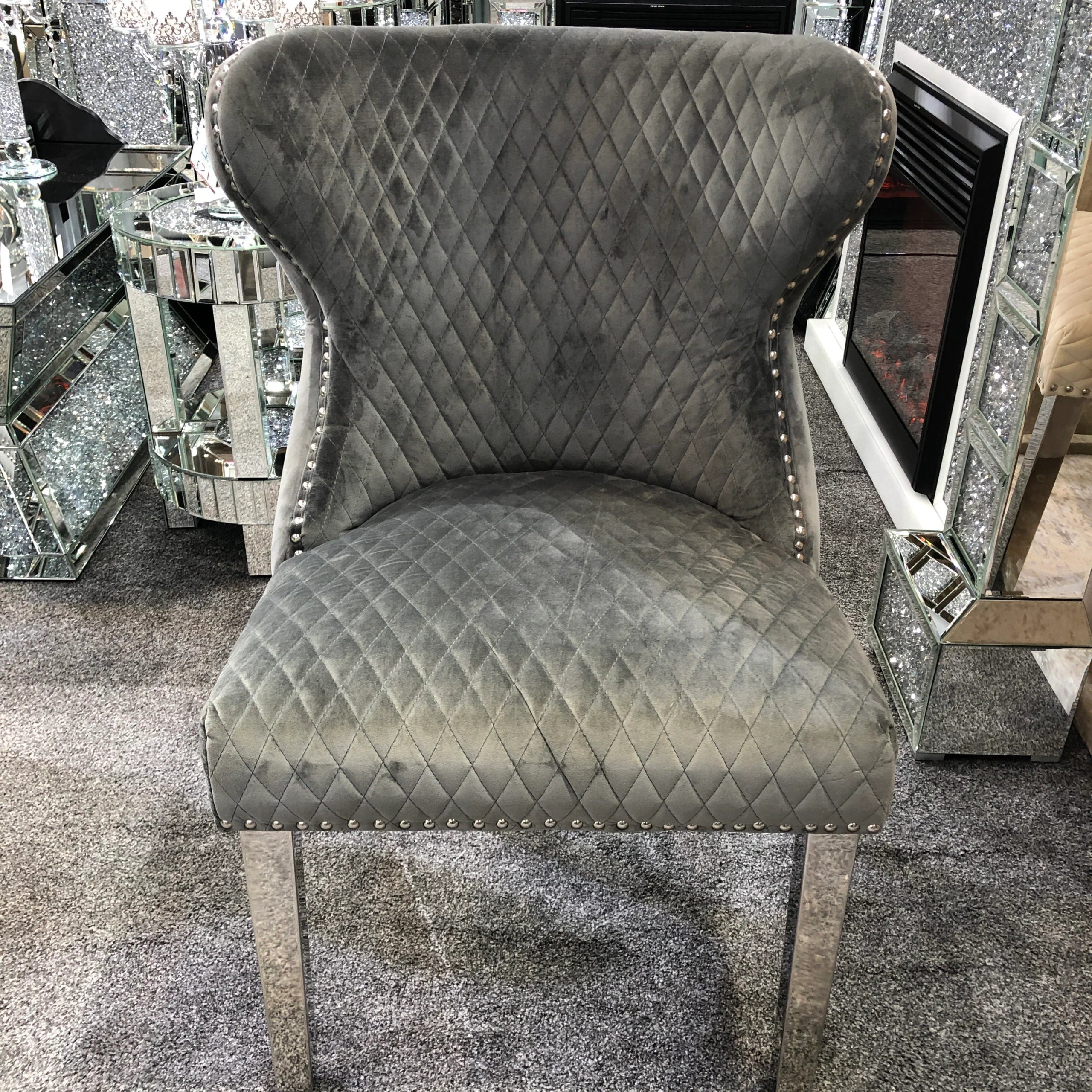 Solid Furniture UK grey Valentino velvet dining chair with chrome legs and lion knocker – main view