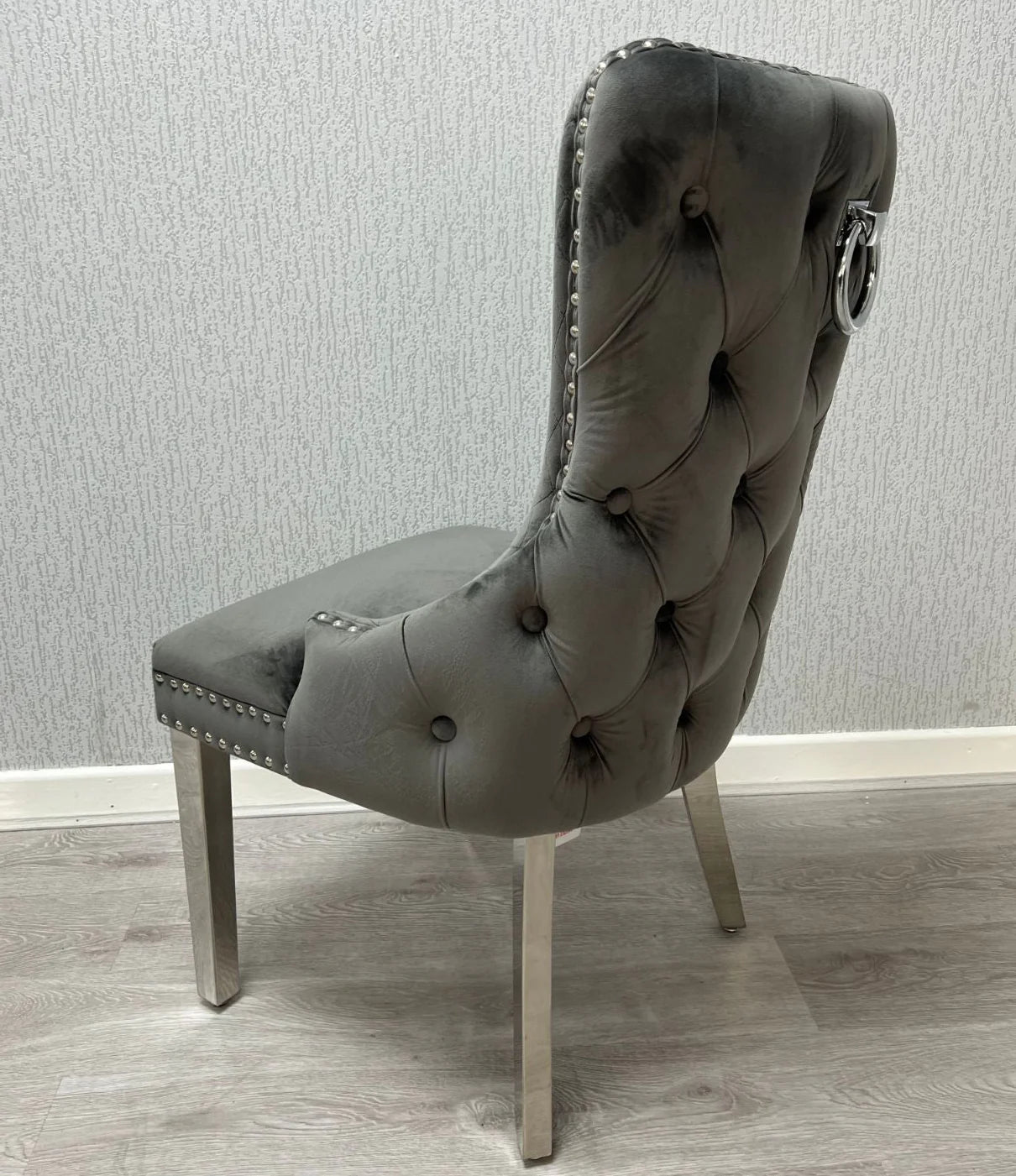 Victoria lion knocker chair grey and silver front view from Solid Furniture UK, modern luxury dining chair with stylish lion knocker detail
