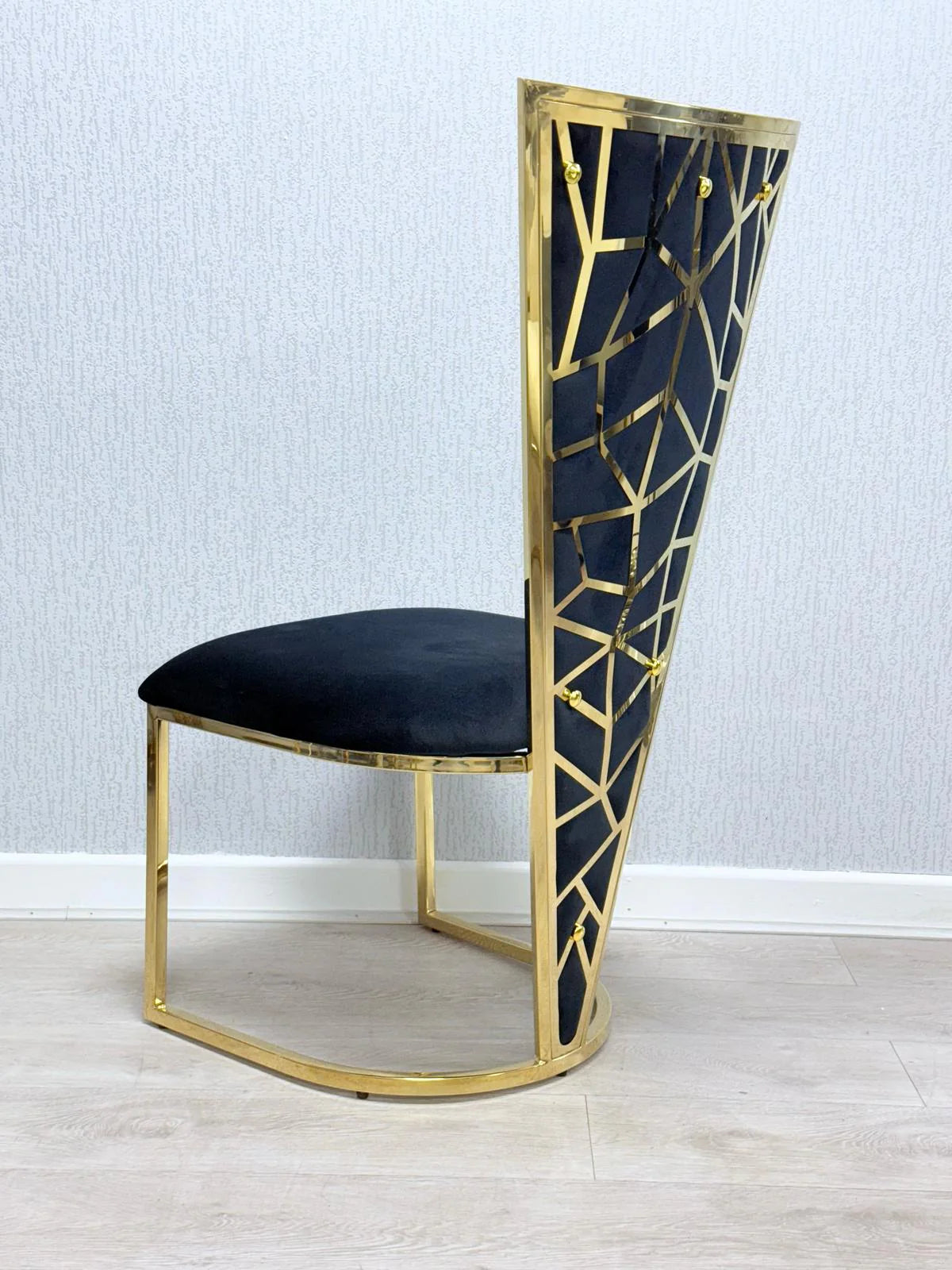Side view of Vienna dining chair black and gold upholstered modern dining chair UK home furniture by Solid Furniture UK