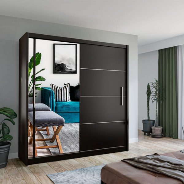 Close-up of smooth sliding mechanism on black wardrobe