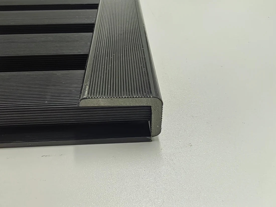 Vertical installation view of black wall panel end trim composite 240cm creating a sleek modern finish from Solid Furniture Ltd UK