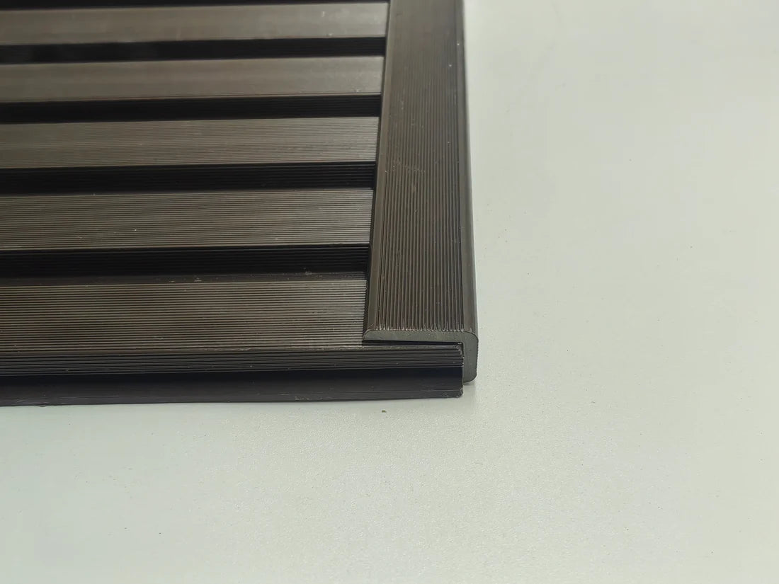 Vertical installation view of dark brown composite wall panel end trim 240cm installed on cladding from Solid Furniture Ltd UK