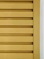Wall panel end trim installed vertically on outdoor wall cladding oak finish Solid Furniture LTD