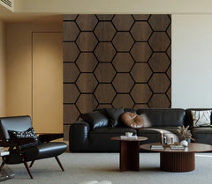 Walnut hexagon acoustic wall panels installed in modern living room feature wall. solid furniture UK