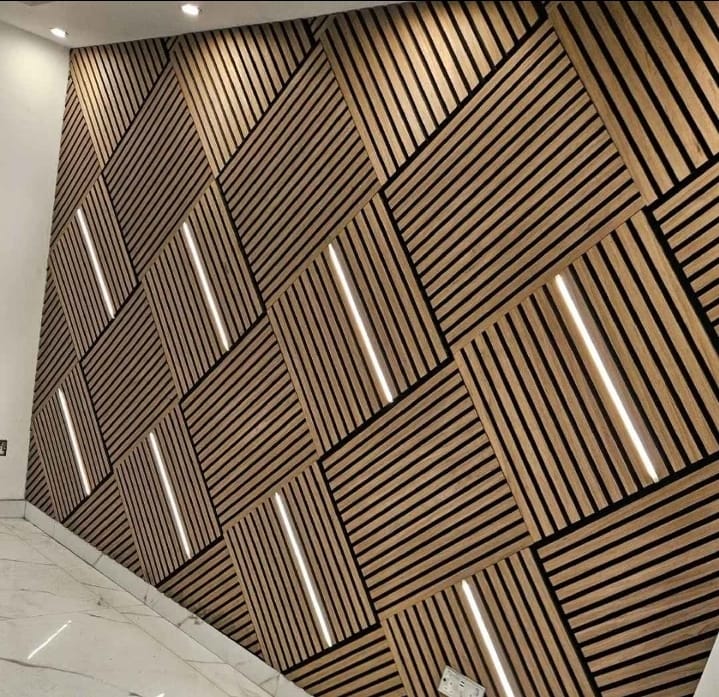 3D decorative walnut acoustic panels 60x60cm being installed on wall by Solid Furniture LTD demonstrating easy DIY installation