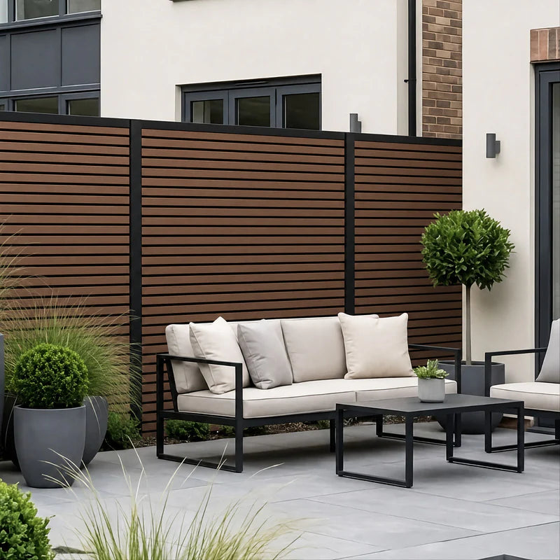 Close up view of walnut composite fence panels by Solid Furniture UK