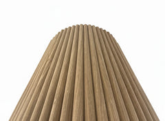 Close-up of Walnut Flute flexible wood veneer acoustic wall panel showing curved fluted slat design and rich natural walnut grain texture solid furniture UK
