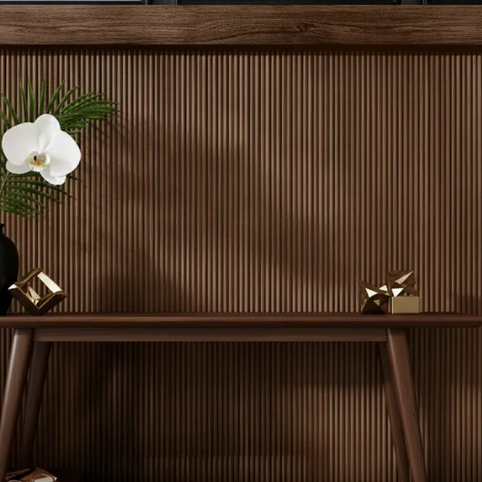 Modern interior with Walnut Flute flexible wood veneer acoustic wall panels installed on wall with soft LED lighting creating a warm, elegant, and sound-enhanced space solid furniture UK