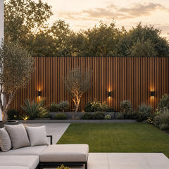 Walnut WPC slatted wall panel 30x240cm installed in a garden – Solid Furniture UK