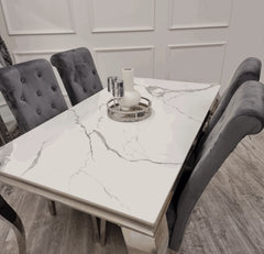 Solid Furniture UK white Louis chrome dining set with dark grey velvet Sofia chairs side view