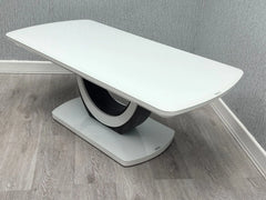 White Texas coffee table side view with high gloss top and U-shaped base | Solid Furniture UK