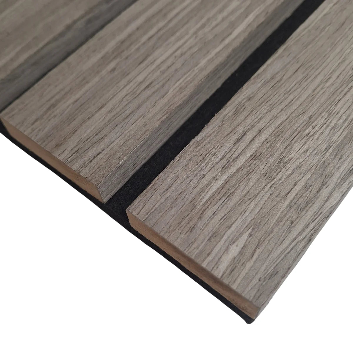Close-up of wide slat 3-sided wood veneer acoustic wall panel in premium grey oak showing rich texture, smooth finish, and modern slat detail solid furniture UK