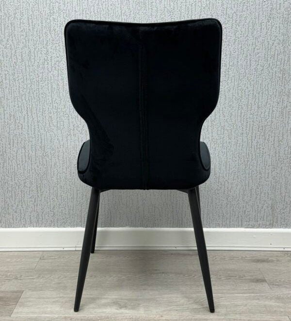 Back view of Black Windsor Velvet Dining Chair Pair with elegant upholstered backrest from Solid Furniture UK