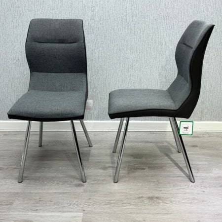 Zermatt grey dining chair showing main and side angles with modern upholstered finish and chrome legs from Solid Furniture UK
